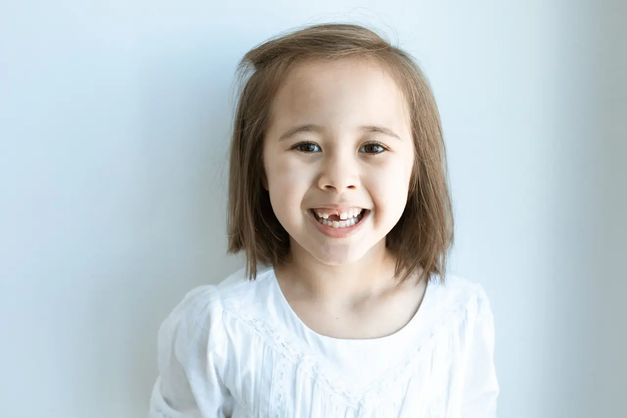 Patient with a bright, confident smile after cosmetic dentistry