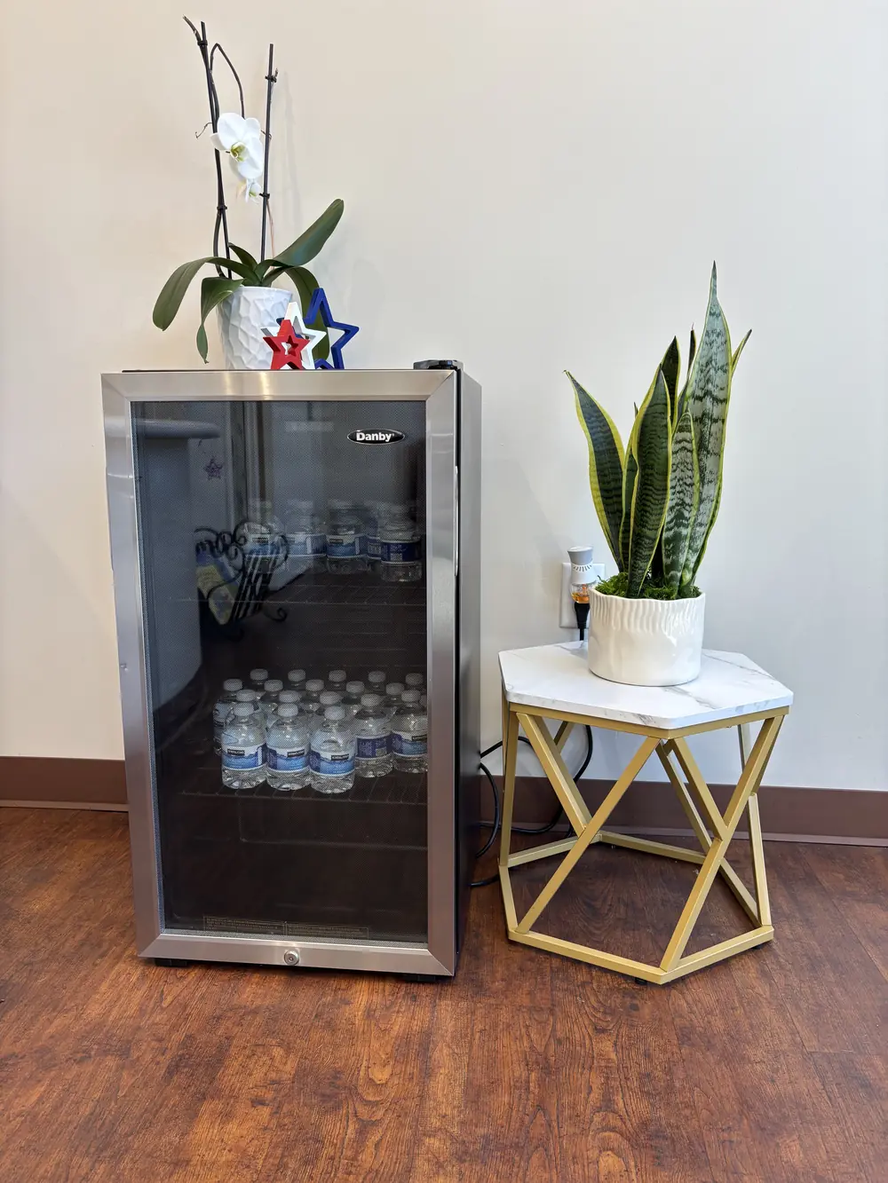 Complimentary bottled water station in the Valley Dental Turlock waiting area